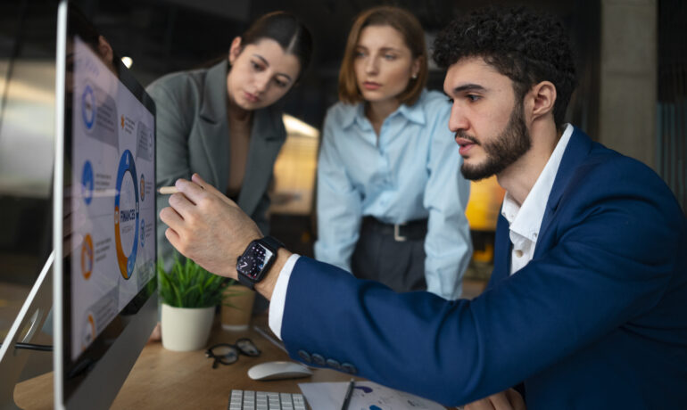 people-office-analyzing-checking-finance-graphs