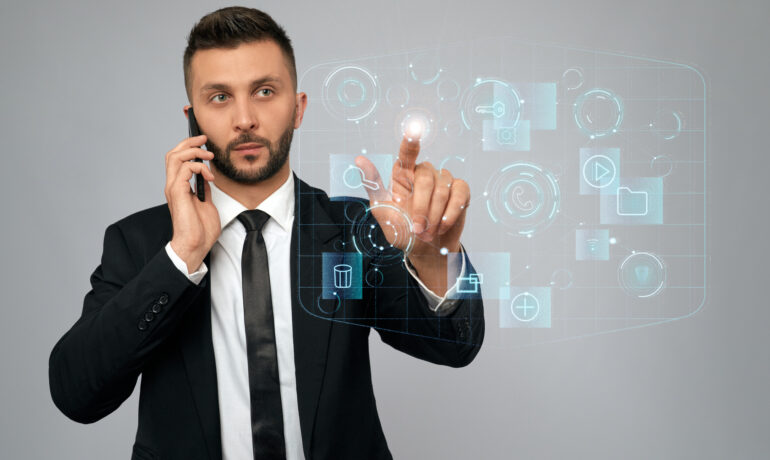 Young businessman clicking virtual button.